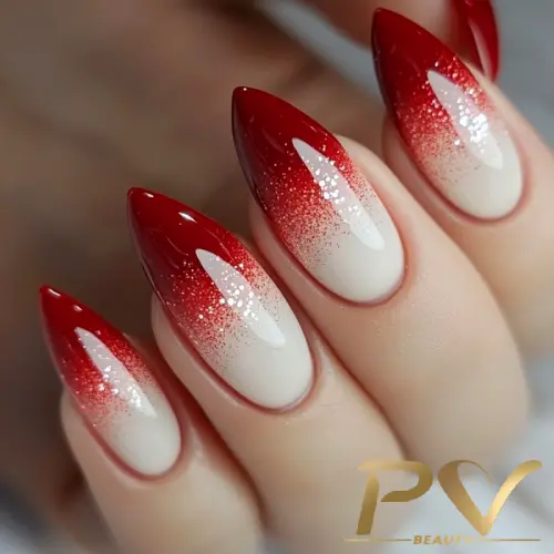 Unha de gel vermelha ombré com acabamento brilhante.
