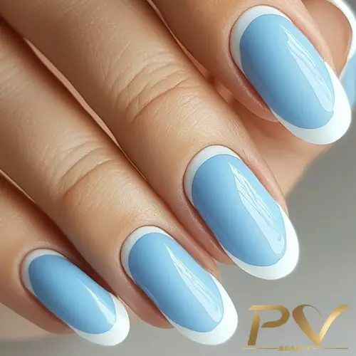 unhas-decorada-azul-francesinha-clara-pv-beauty-30 Unhas decoradas com esmalte azul claro e bordas brancas, com acabamento brilhante.