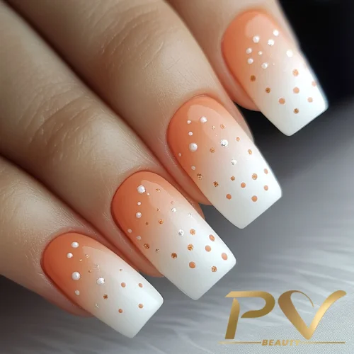 unhas-laranja-decoradas-poa-pv-beauty-15 Unhas decoradas em tons de laranja e branco, com pontos brancos e dourados.